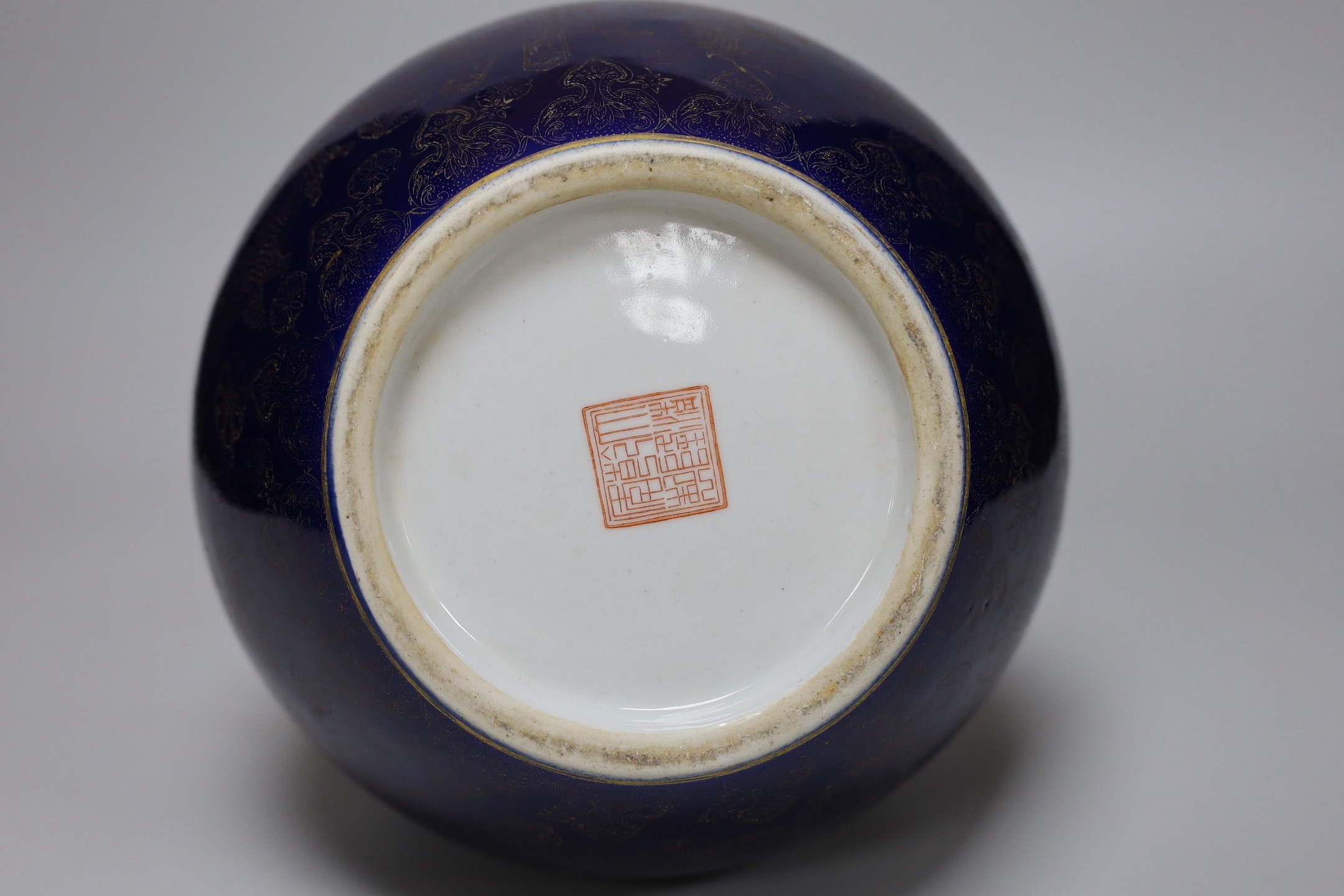 A large Chinese gilt decorated blue glazed double gourd vase, 31cm